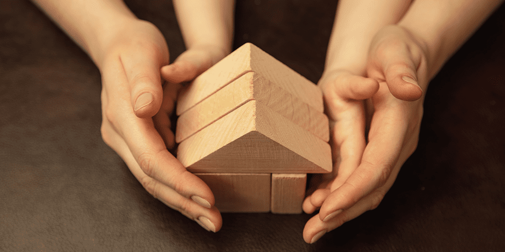 collecting-wooden-constructor-like-house-close-up-shot-female-kid-s-hands-doing-different-things-together-family-home-education-childhood-charity-concept-mother-son-daughter